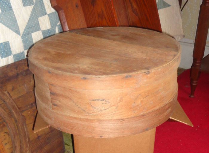 Wood cheese drum.