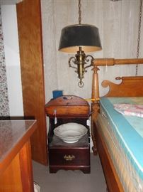 Bedside stand and another rope bed.