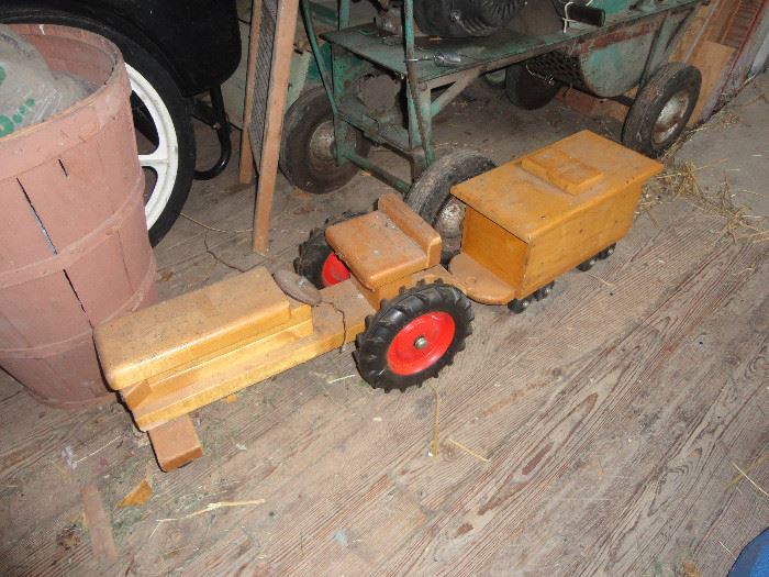Toy tractor made of wood blocks.