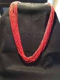 Multi strand coral heishi necklace with sterling clasp