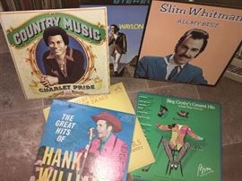 Remarkable collection of country music albums. More than what you see here. Check out that Waylon Jennings LP peeking out from the back.