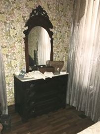 Wonderful mirror! Top of plantation mahogany carved chest with marble top