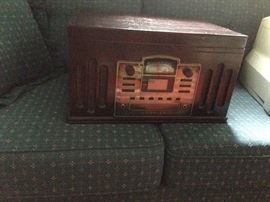 Queen sleeper sofa with a vintage radio