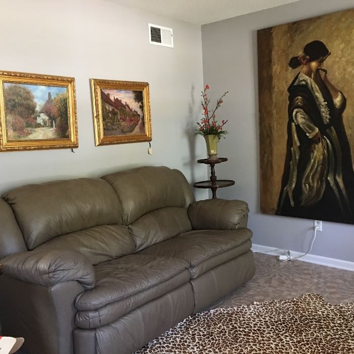 Now $ 225.00. Lane Leather sofa with recliners, pair of oil paintings, antique 3 tier table and large Uttermost art of woman