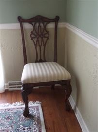 We will be takin bids on this beautiful table 8 chairs and two leaves. This unit came from Hutsons in Cape Girardeau and is in superb condition. The rug under the table is 8x12 and is excellent quality - priced separate.