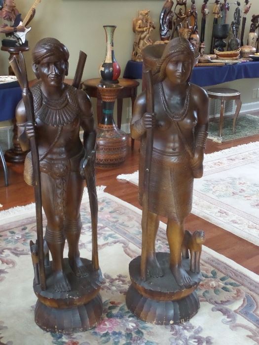  very heavy,hand carved wooden statues, 4 feet tall
