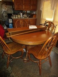 OAK TABLE AND 4 CHAIRS WITH LEAVES