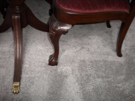 Ethan Allen 18th Century Mahogany Dining Table with banded parquetry & The feet are capped with solid brass. Chippendale style dining room chairs 4 side and 2 arm