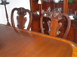 Drexel Travis Court 51″ Bow Front China Cabinet & Ethan Allen 18th Century Mahogany Dining Table with banded parquetry & The feet are capped with solid brass.