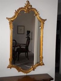 Ornate gold accent framed mirror