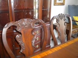 Drexel Travis Court 51″ Bow Front China Cabinet & Ethan Allen 18th Century Mahogany Dining Table with banded parquetry & The feet are capped with solid brass. Chippendale style dining room chairs 4 side and 2 arm