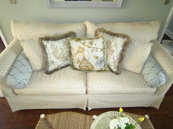 Sofa with good bones, but heavy cat scratches on the corner. Slipcover!