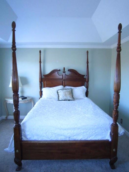 Queen four poster bed.  Frame only. Mattress and boxsprings not included.