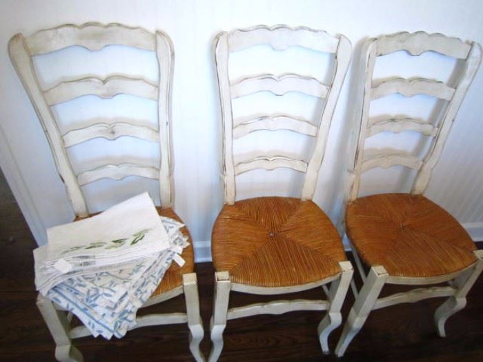 There are 6 of these ladderback chairs for sale.