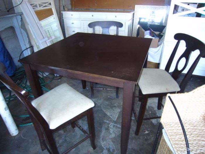 Pub table with 3 stools.  Seats need recovering.