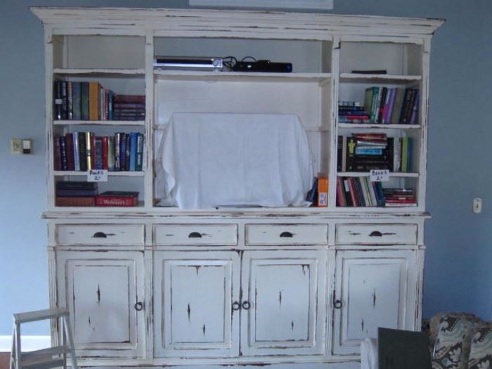 Large shabby chic shelving unit 100" W x 94"H. There are 2 additional shelves that can be added where the tv is sitting now. The step stool goes with it!