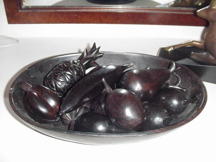 Carved fruit in bowl, ebony