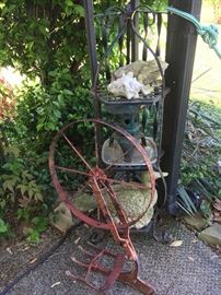 Outdoor items--plow, plant stand.