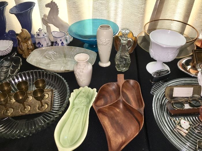 Tables full of vintage items--glassware, china, décor.
