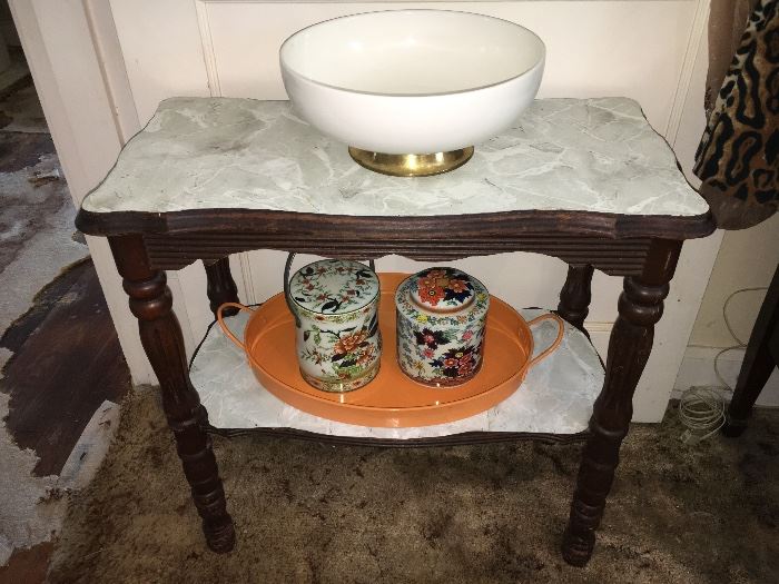 Vintage two-tier table. Just peel off the adhesive faux marble off and you'll be ready to paint it refunydh.
