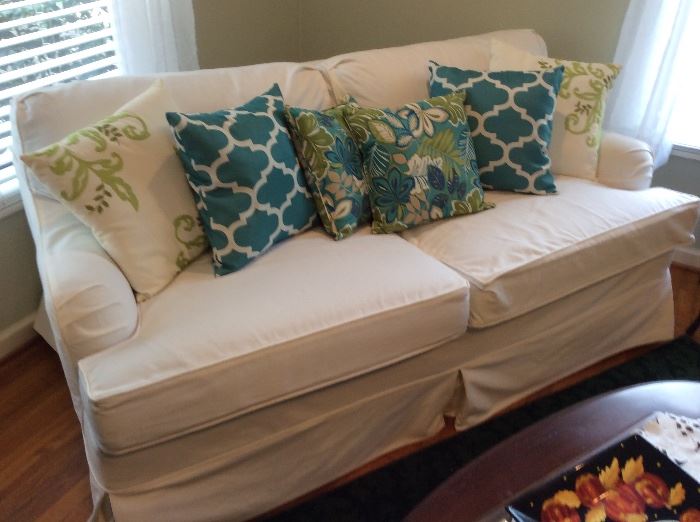 Hideaway white sofa, pillows sold separately 