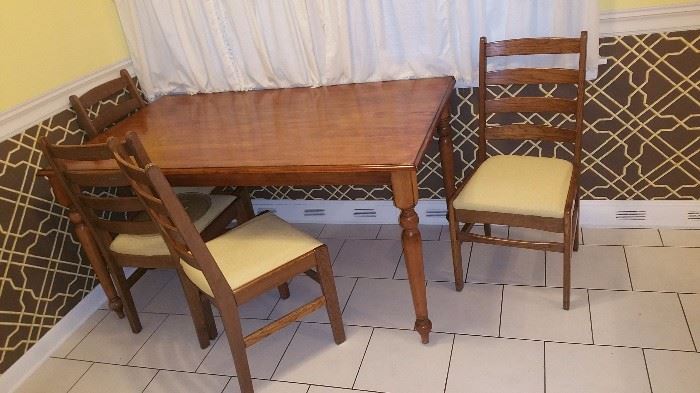 Wood kitchen table with 6 chairs (2 not pictured). Great for a starter home! 