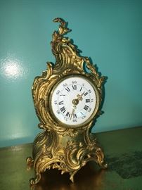 French mantle clock, gold gilt, of course!