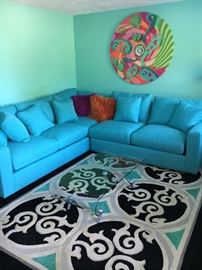 More eye-popping artwork- this one titled "Coral Reef" 48" in diameter, acrylic on canvas. Black and aqua rug as well as FIAM ITALIA glass coffee table!