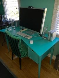 Green upholstered chair - painted aqua desk.