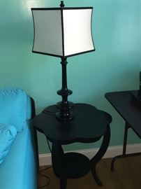 Black side table with fabulous black and white accent lamp.