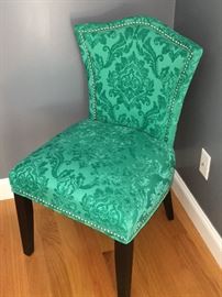 Upholstered emerald green chair, black lacquer legs - featuring nailhead accents.