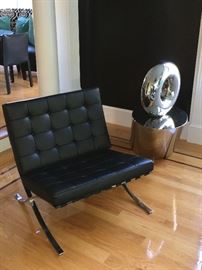 Yes, this is the same chair as the last pic! We do NOT have two! But it is a view without the pillows! It is in perfect condition!