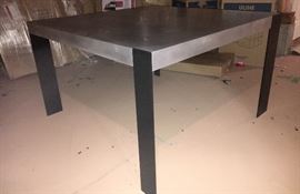 Haven't brought this upstairs yet but wanted you to see this stunning Antoine Proulx 48"x48" dining table. Contemporary, sleek, modernistic.