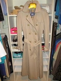 There are two ladies Burberry classic trench coats