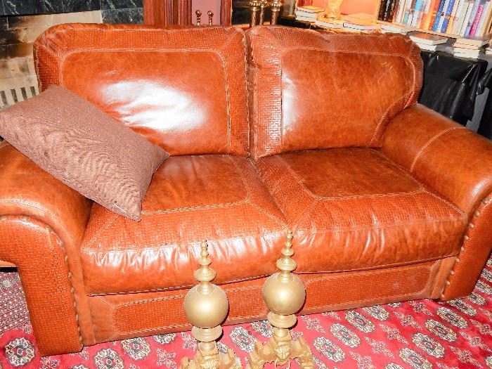 Extra luxurious leather love seat.