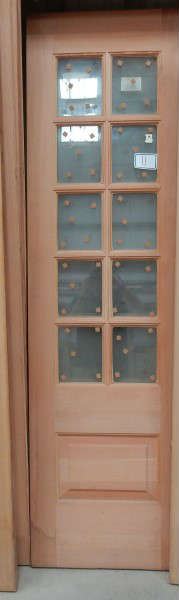 Pair of doors with 4 lights over raised panel