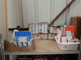 Lots of hinges with screws: stainless steel, beige, black