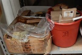 Lots of brass hinges with bucket of screws