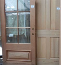 3 doors, 1 with 6 tempered glass lights over raised panel & pair of doors with 4 raised panels