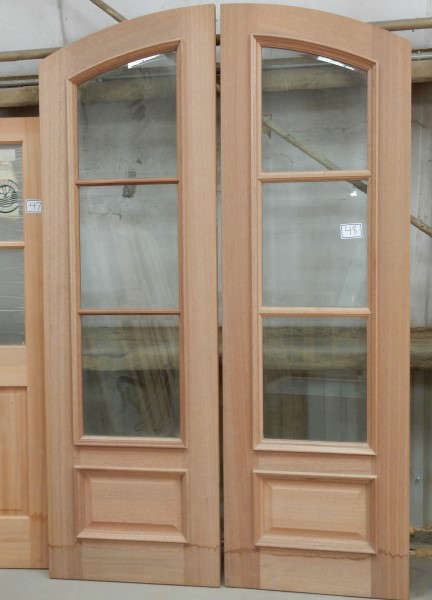 Beautiful pair of mahogany front doors with 6 total beveled lights over raised panels