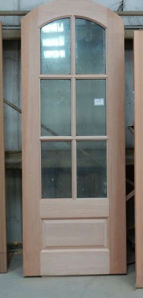 Mahogany door with arch. 6 lights over raised panel