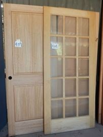 3 doors, 1 with 4 raised panels, 1 with 15 lights, 1 with 2 raised panels