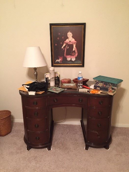 Kidney-shaped desk with glass top. Will sell without all that stuff on top of it.