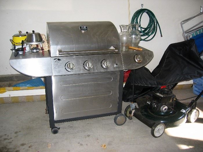 3 burner grill in great condition, lawn mower