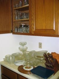 lots of pressed glass, dishwasher safe goblets, compotes, cruets, butter dishes, etc.