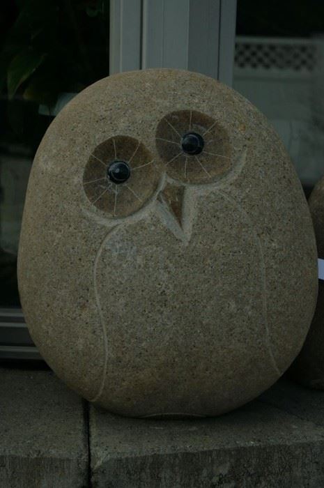 Granite owl and other statuary available at business.