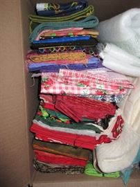 LOTS AND LOTS OF FABRIC, SHE WAS A HUGE QUILTER AND WE HAVE ROOMS OF FABRIC TO GO THRU, ALL NICE AND CLEAN