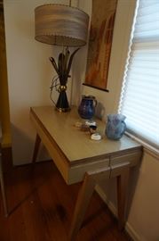 Notice how that 75 inch table just tucks in the corner when folded down!