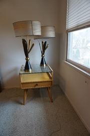 Mid-Century, blonde oak corner table, and very unusual lamps. 