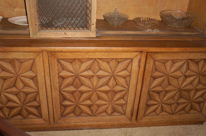 Detail on the bottom of this china cabinet is so nice, behind 2 doors there is a shelf, one door reveals 3 doors.